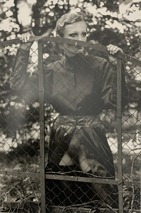Helmut Newton - Roselyn behind fence, Arcangues, France 1975 print in colors - FineArt Vendor
