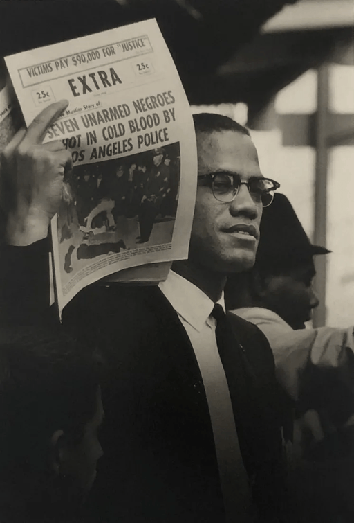 Gordon Parks - Malcolm X, Muslim Newspaper, 1963 - FineArt Vendor