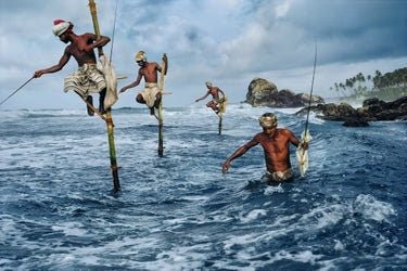 Steve McCurry - Stilt Fishermen, Sri Lanka, 2015 print in colors - FineArt Vendor